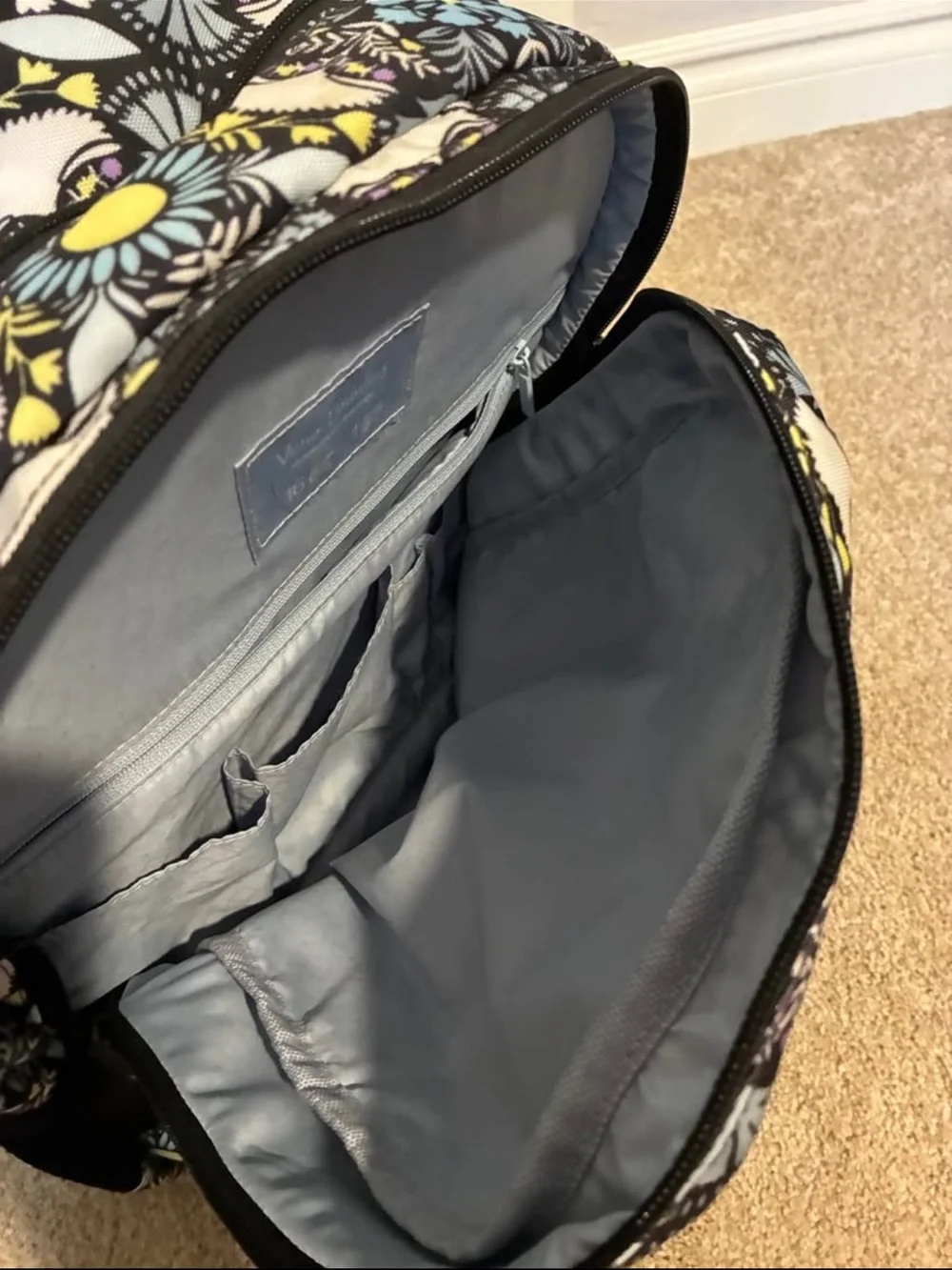 Rolling Vera Bradley Black, Yellow & Light Blue Floral Backpack
